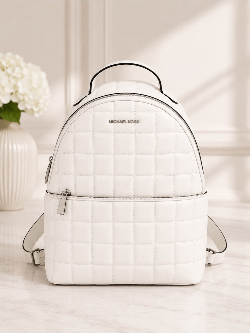 Michael Kors White Quilted Leather Backpack Silver Hardware Front Zip Pocket